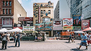 Photo of People at the Street