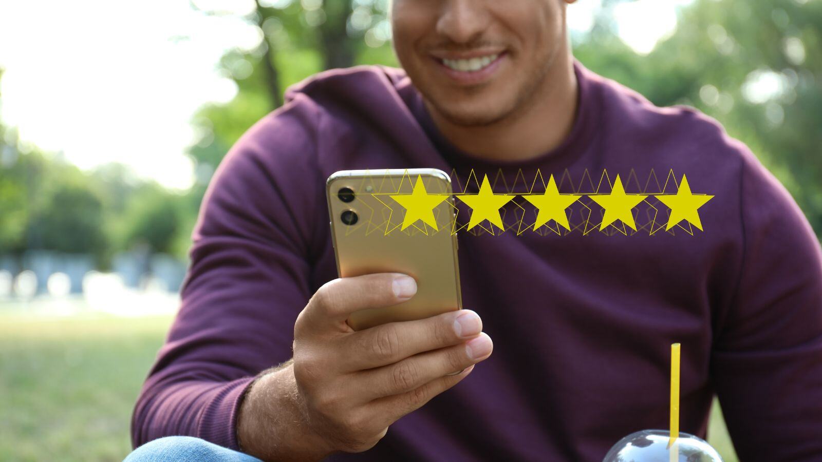 Man on his phone leaving a review