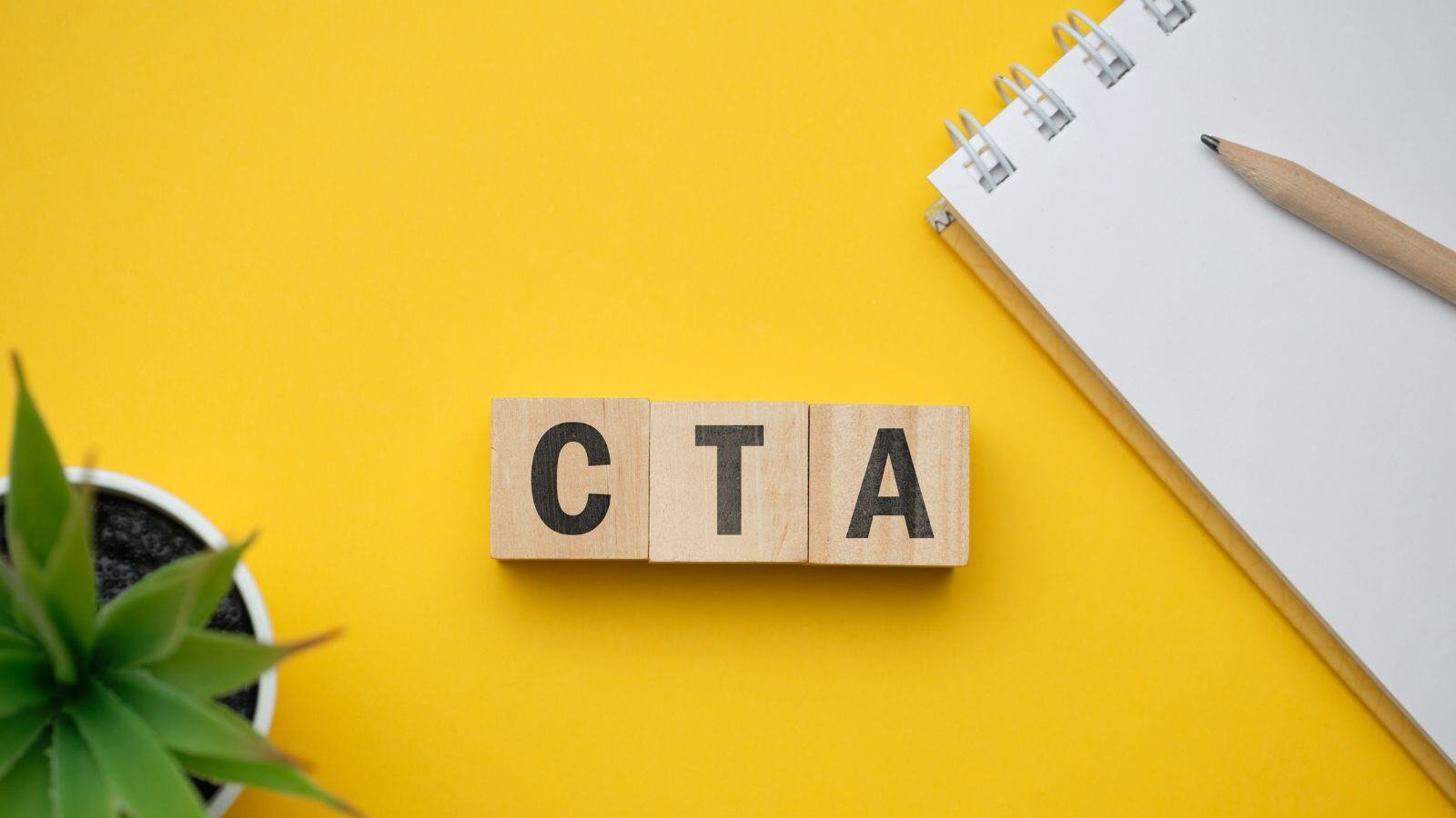 yellow background with scrabble letter tiles spelling out 